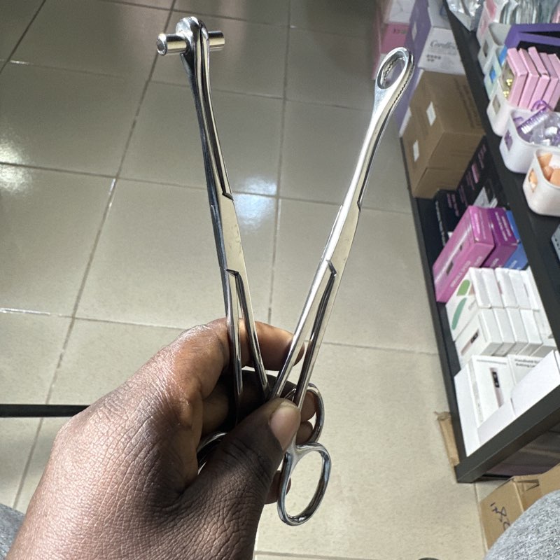 Metal piercing forceps